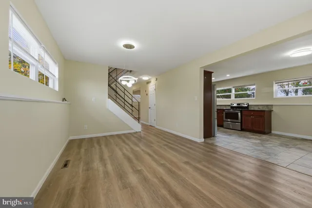 a view of a livingroom with wooden floor