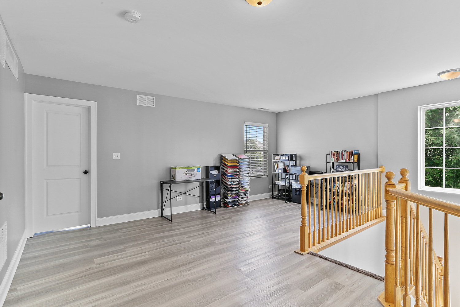 7007 Creekside Drive Plainfield, IL 60586 - Photo 12 of 21 a view of a livingroom with furniture and hardwood floor