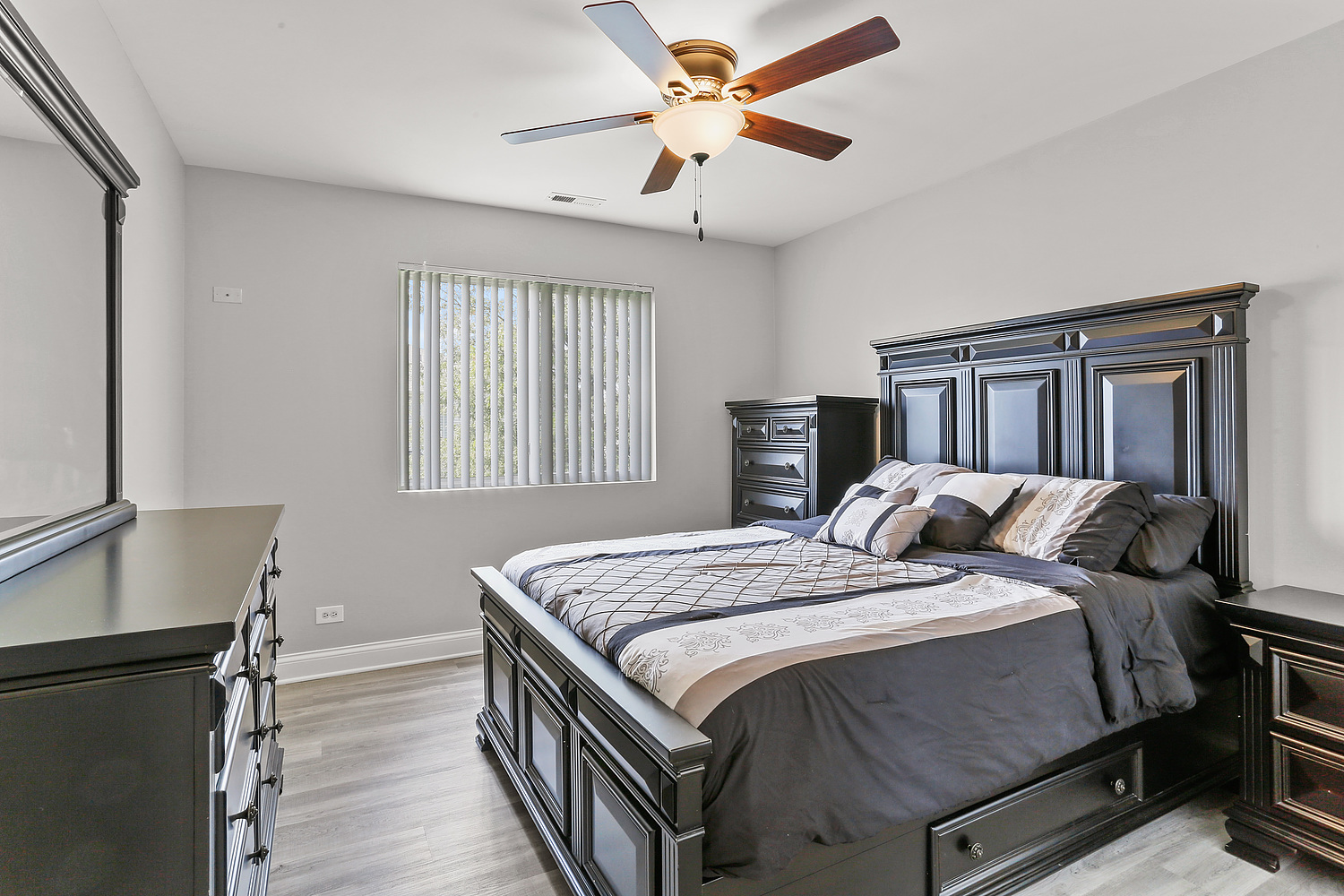 7007 Creekside Drive Plainfield, IL 60586 - Photo 14 of 21 a bedroom with a bed and a window