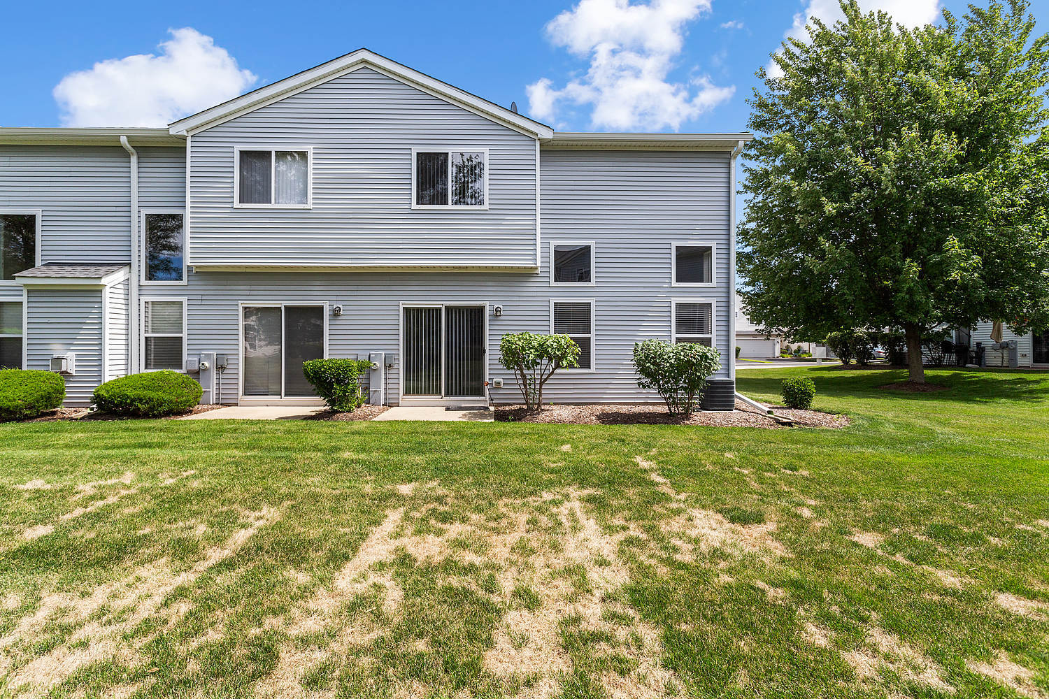 7007 Creekside Drive Plainfield, IL 60586 - Photo 21 of 21 a front view of house with yard and green space