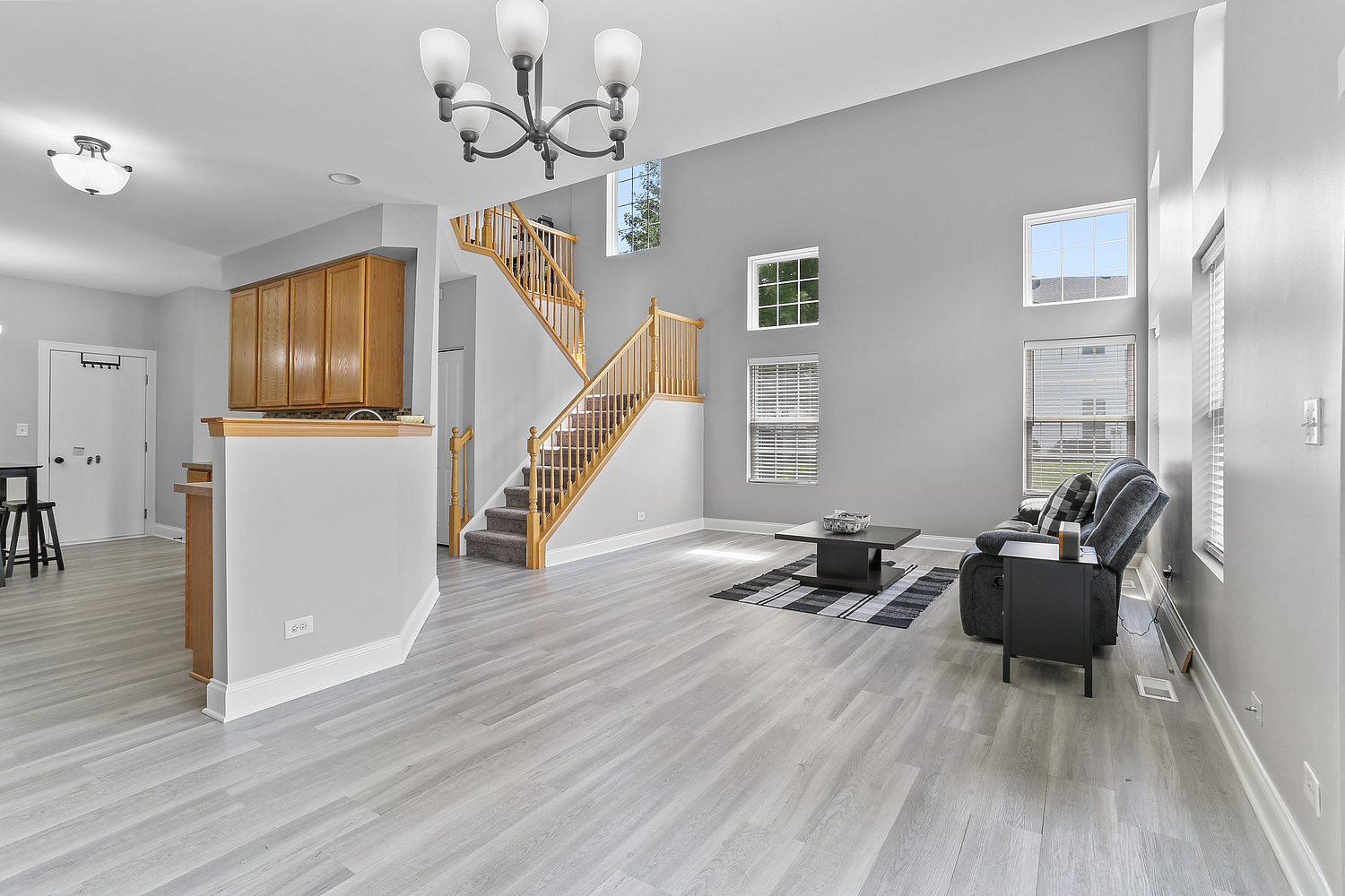 7007 Creekside Drive Plainfield, IL 60586 - Photo 4 of 21 a living room with furniture and wooden floor