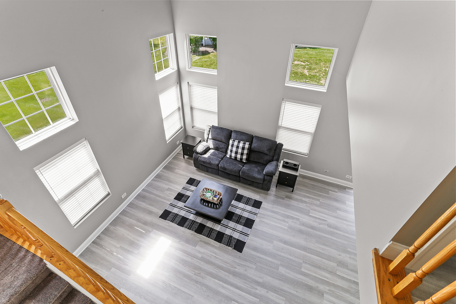7007 Creekside Drive Plainfield, IL 60586 - Photo 9 of 21 a living room with furniture and a wooden floor