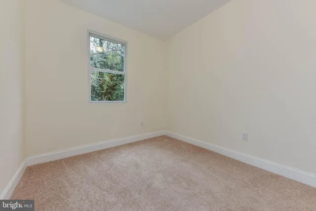 a view of a room with an empty space