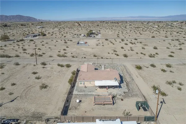 wooden floor with a mountain view