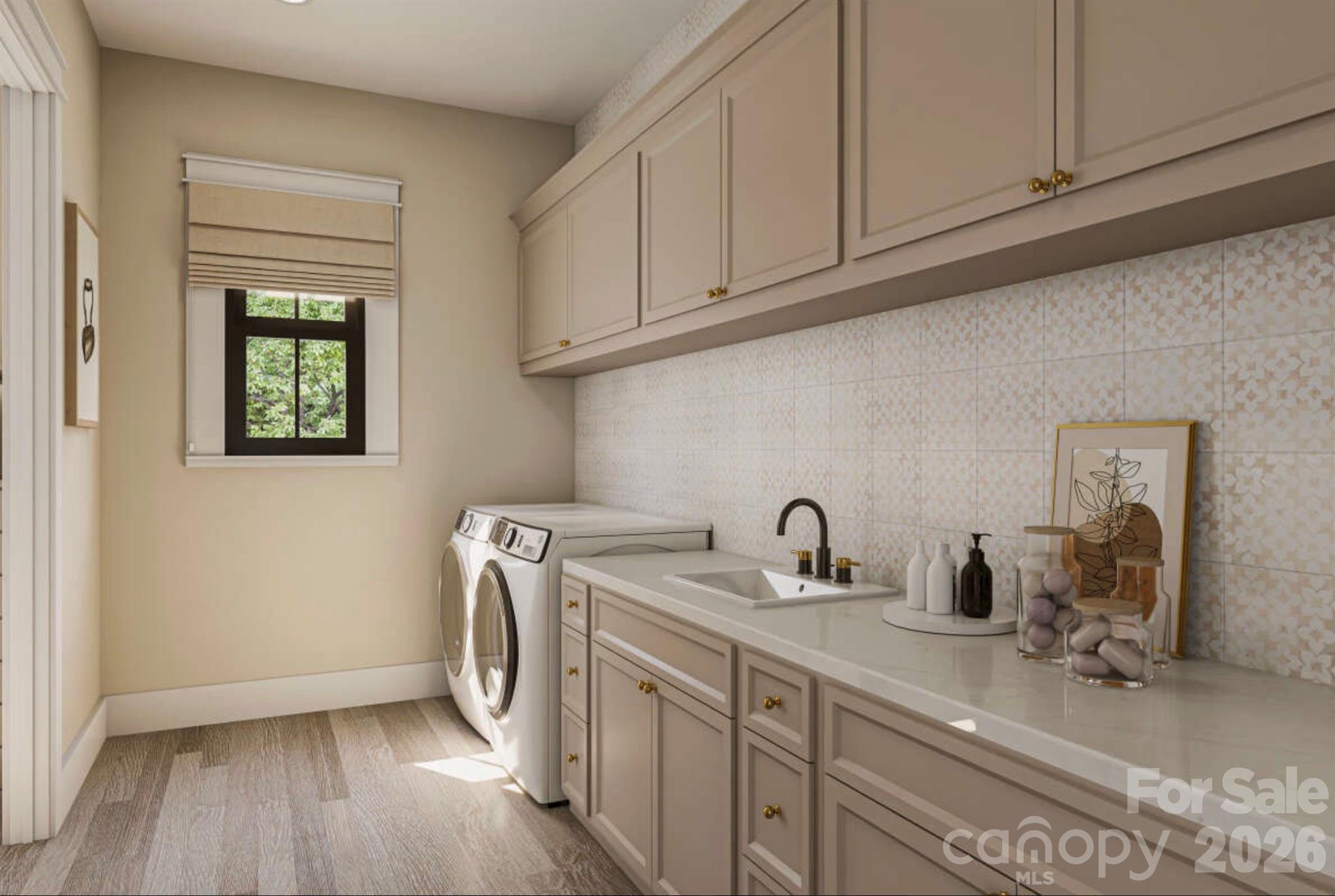 0 Ander Vincent Road, Unit B2 Lancaster, SC 29720 - Photo 14 of 16 a kitchen with a sink cabinets and a wooden floor