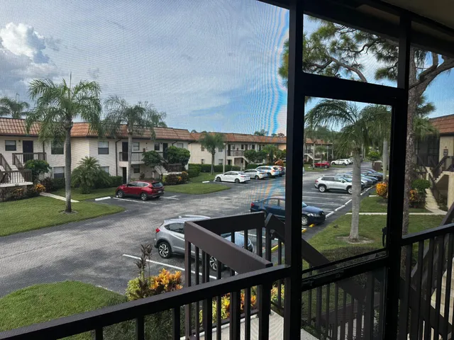 a view of a porch with a yard