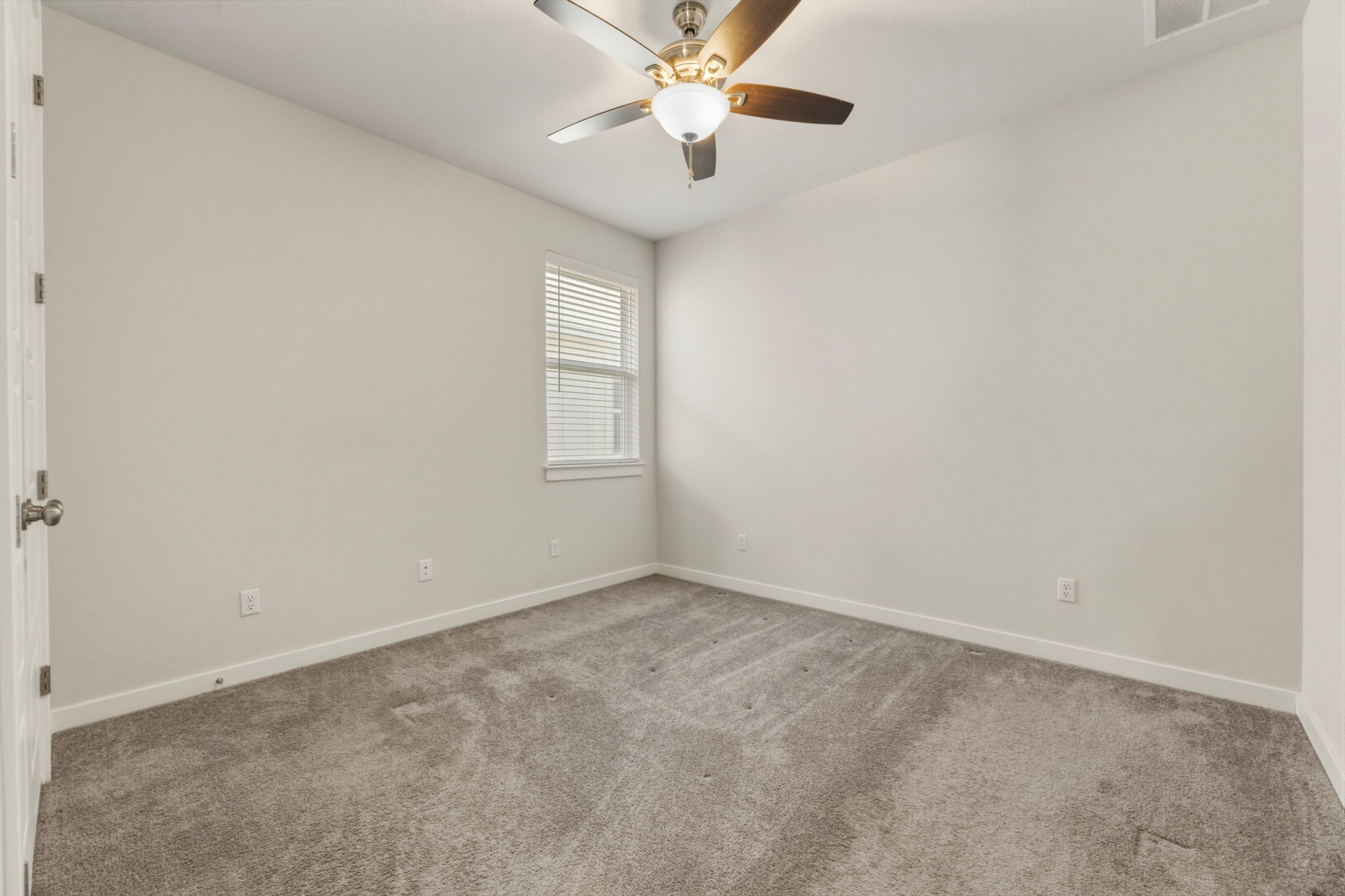 116 Tanali Trail Georgetown, TX 78628 - Photo 14 of 40 Spare room featuring carpet floors and ceiling fan