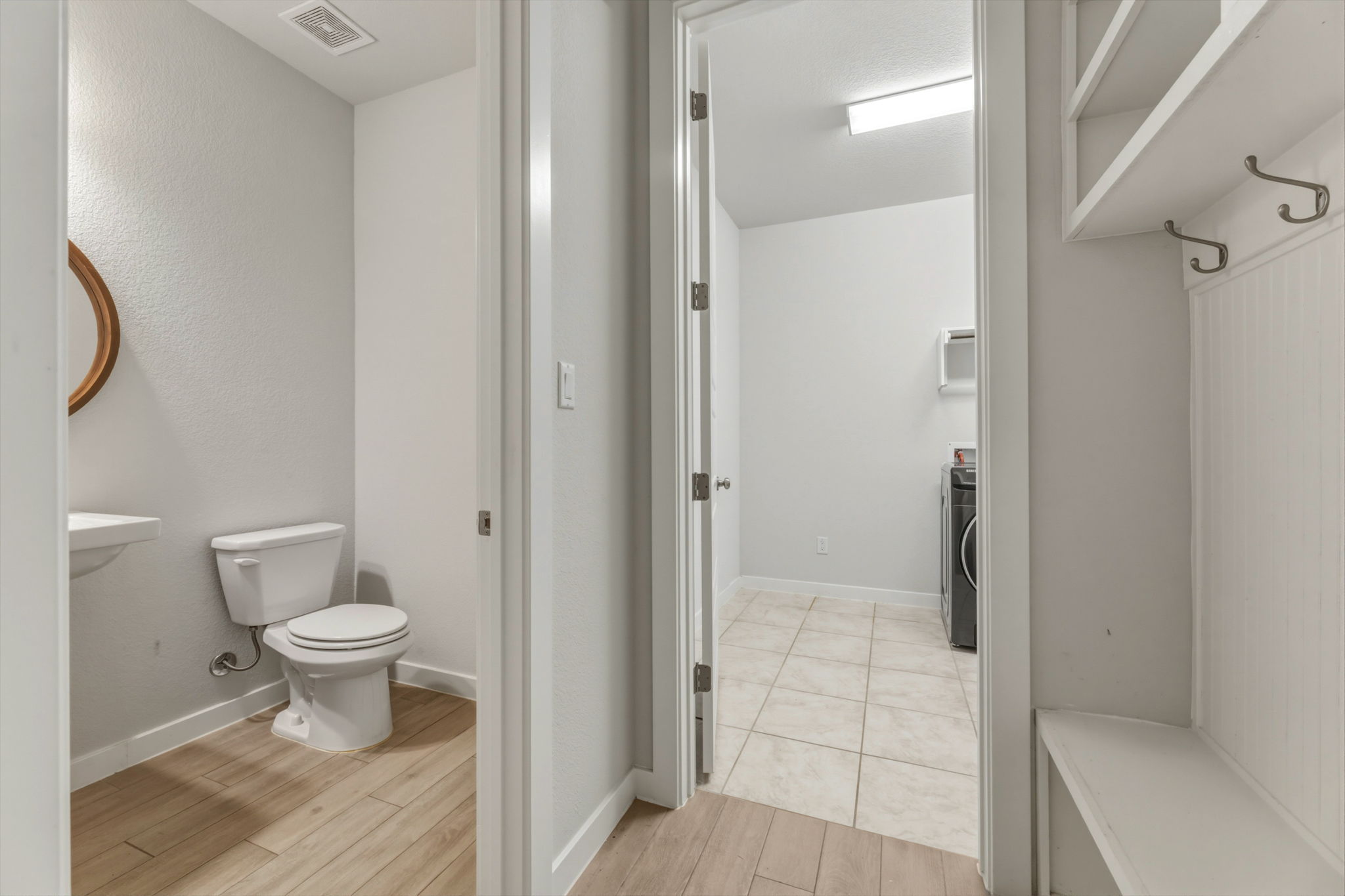 116 Tanali Trail Georgetown, TX 78628 - Photo 15 of 40 Half bath with toilet and light wood finished floors
