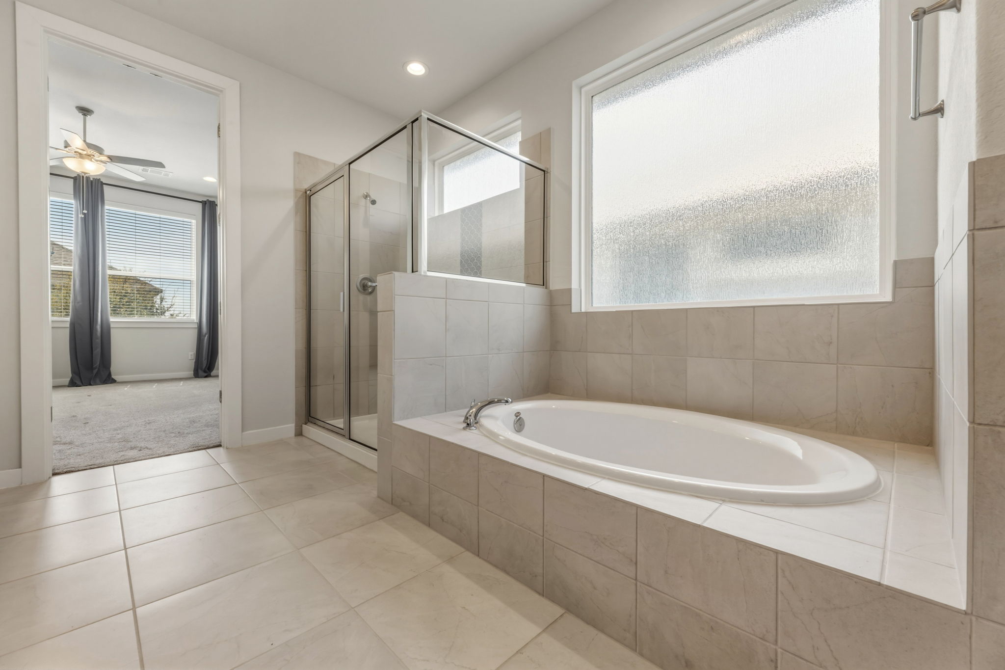 116 Tanali Trail Georgetown, TX 78628 - Photo 31 of 40 Bathroom featuring a shower stall, a garden tub, light tile patterned floors, ceiling fan, and recessed lighting