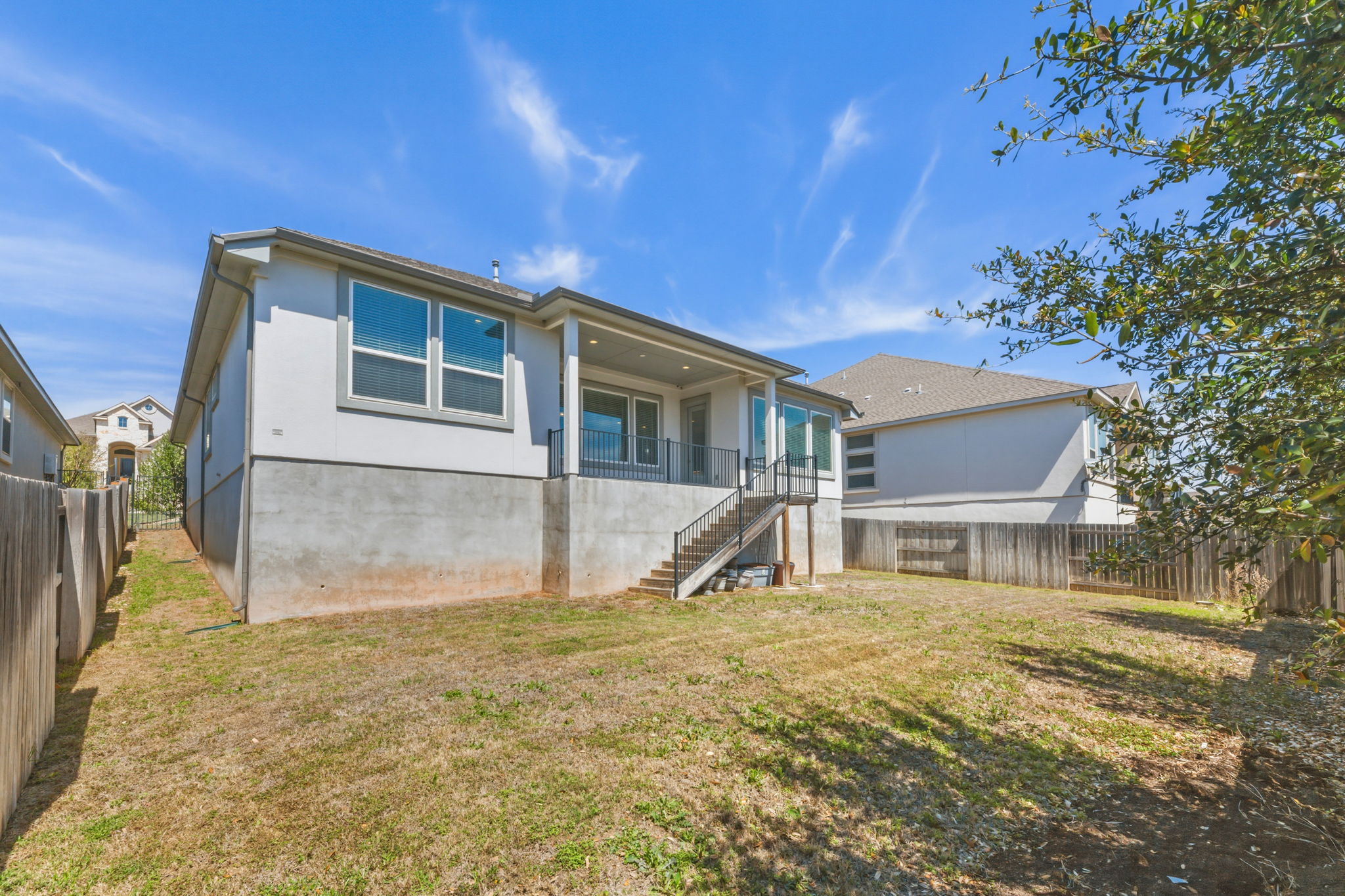 116 Tanali Trail Georgetown, TX 78628 - Photo 38 of 40 Rear view of house with a fenced backyard