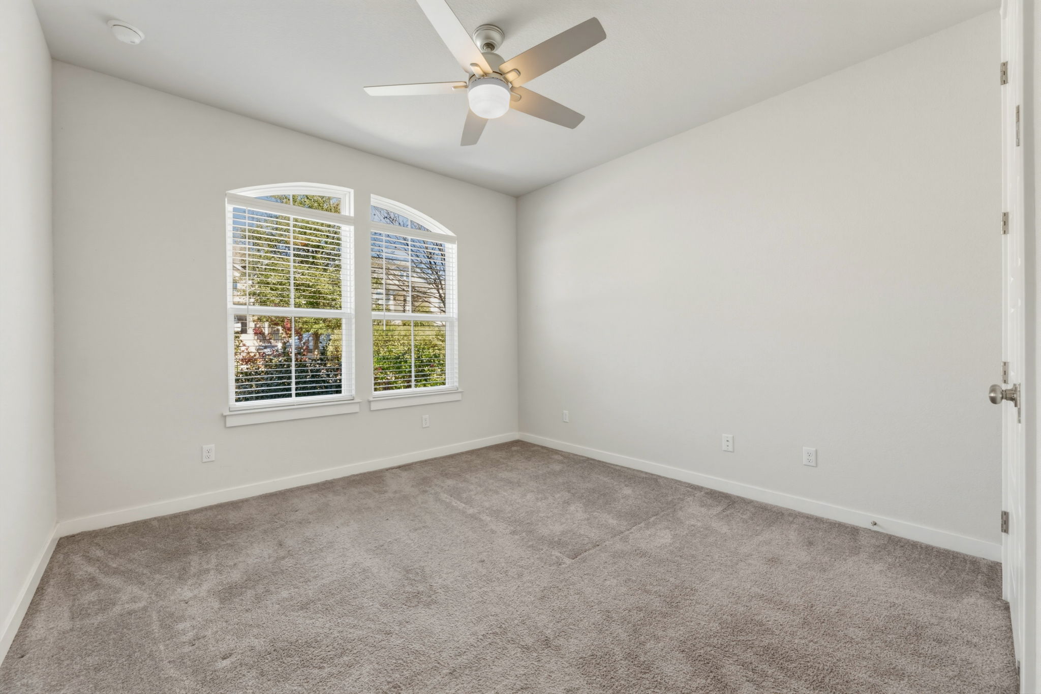 116 Tanali Trail Georgetown, TX 78628 - Photo 10 of 40 Carpeted spare room with baseboards and a ceiling fan