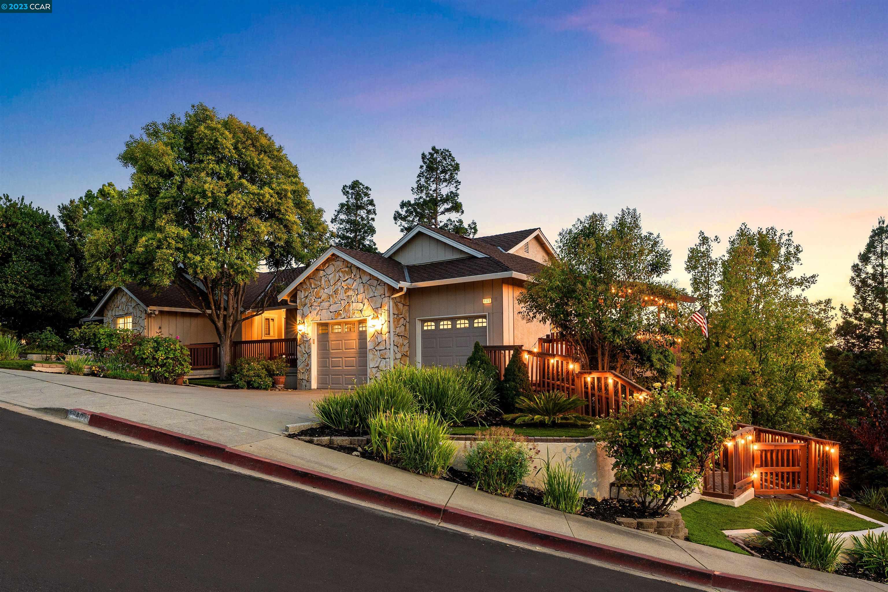 4020 Rhoda Way Concord, CA 94518 - Photo 1 of 1 a front view of a house with a yard and garage