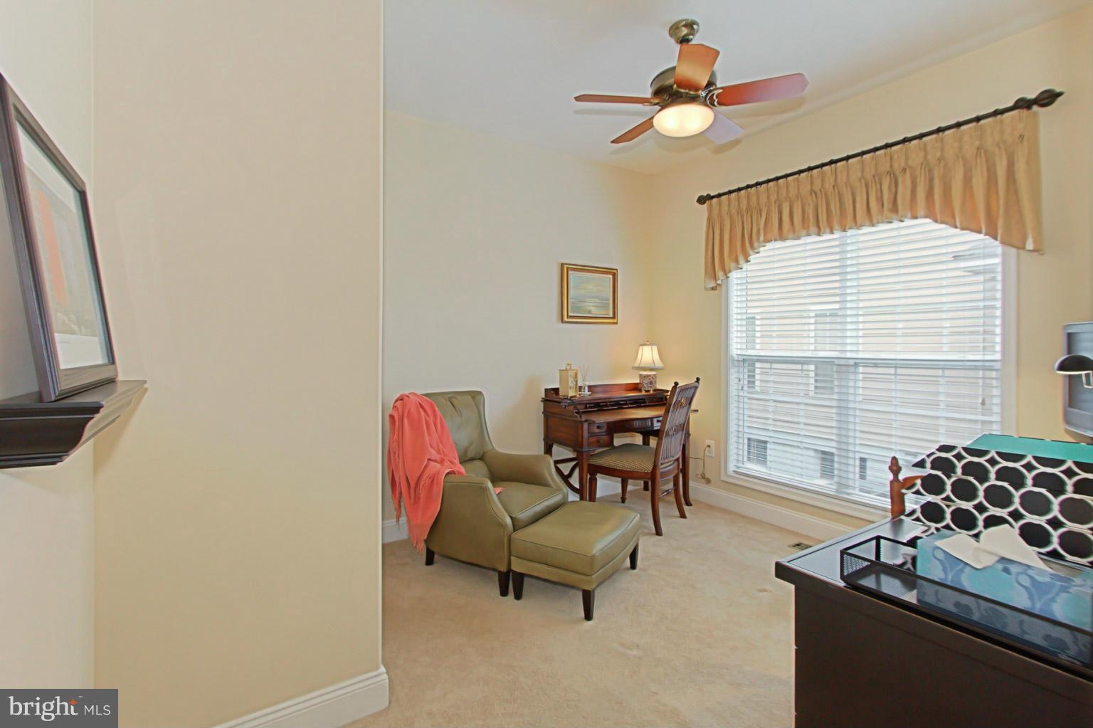 8548 Bauer Circle Springfield, VA 22152 - Photo 17 of 30 a living room with furniture and a window