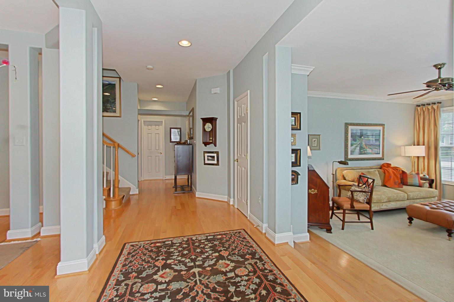 8548 Bauer Circle Springfield, VA 22152 - Photo 3 of 30 a living room with furniture and a rug