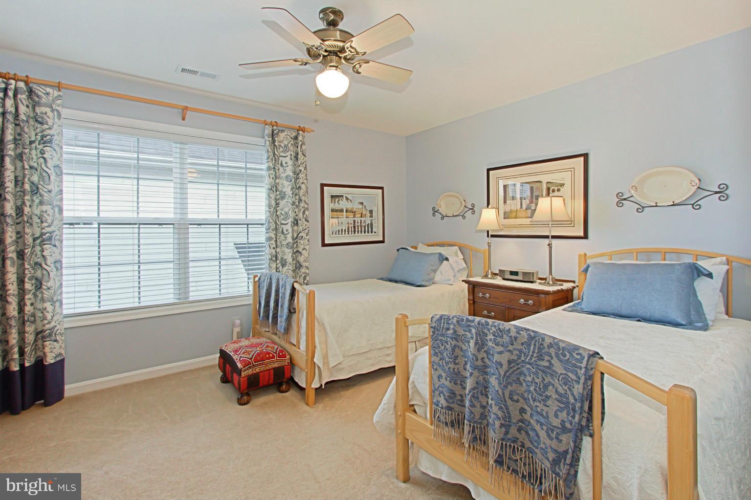 8548 Bauer Circle Springfield, VA 22152 - Photo 24 of 30 a bedroom with furniture and a large window