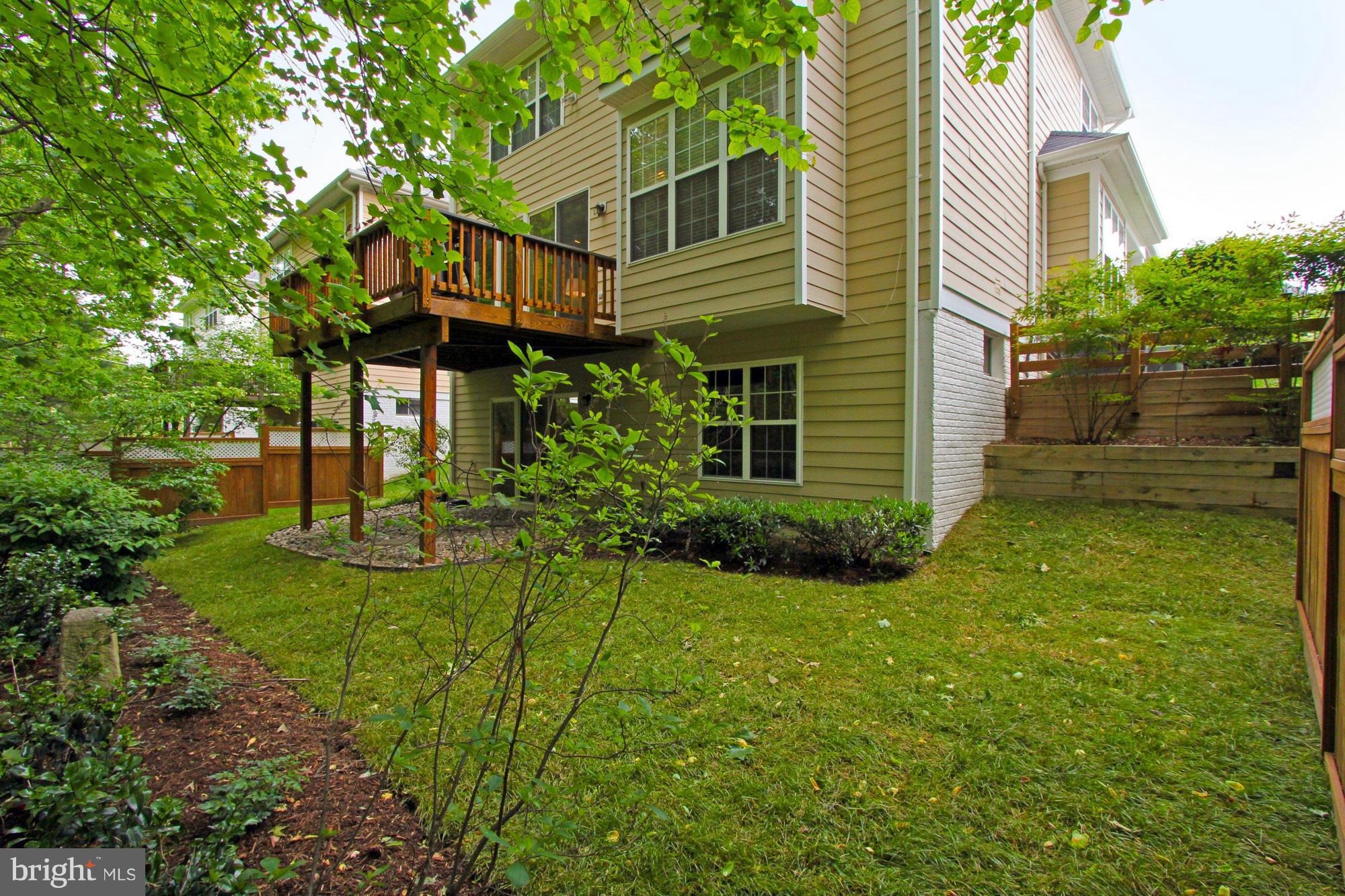 8548 Bauer Circle Springfield, VA 22152 - Photo 30 of 30 a view of a house with backyard and garden