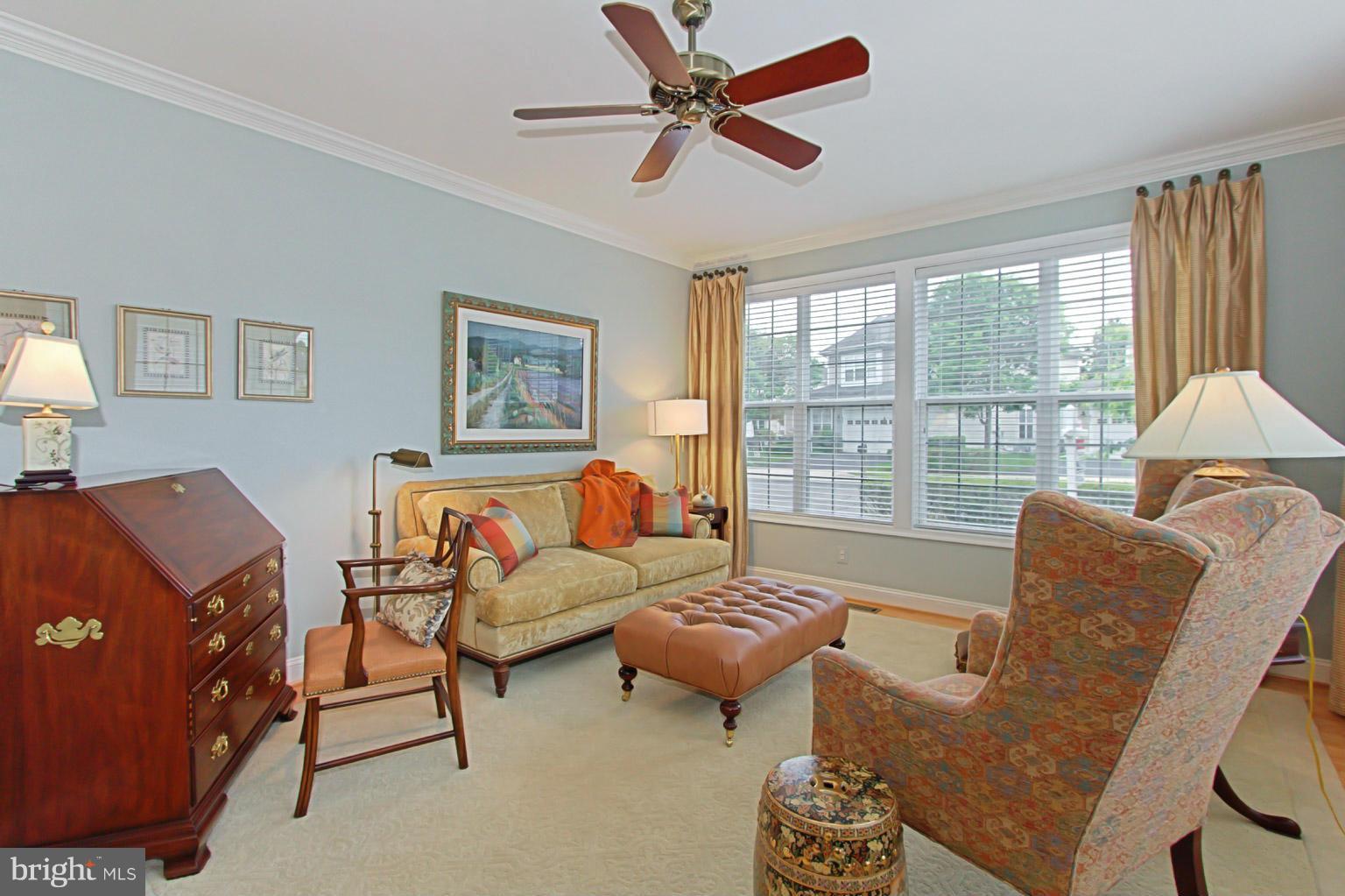 8548 Bauer Circle Springfield, VA 22152 - Photo 6 of 30 a living room with furniture and a large window