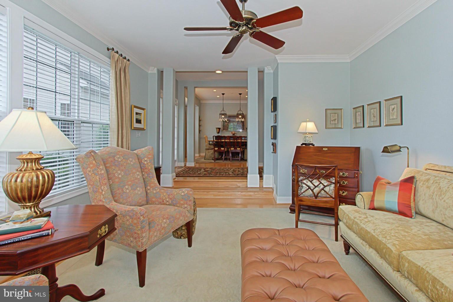 8548 Bauer Circle Springfield, VA 22152 - Photo 7 of 30 a living room with furniture and a wooden floor