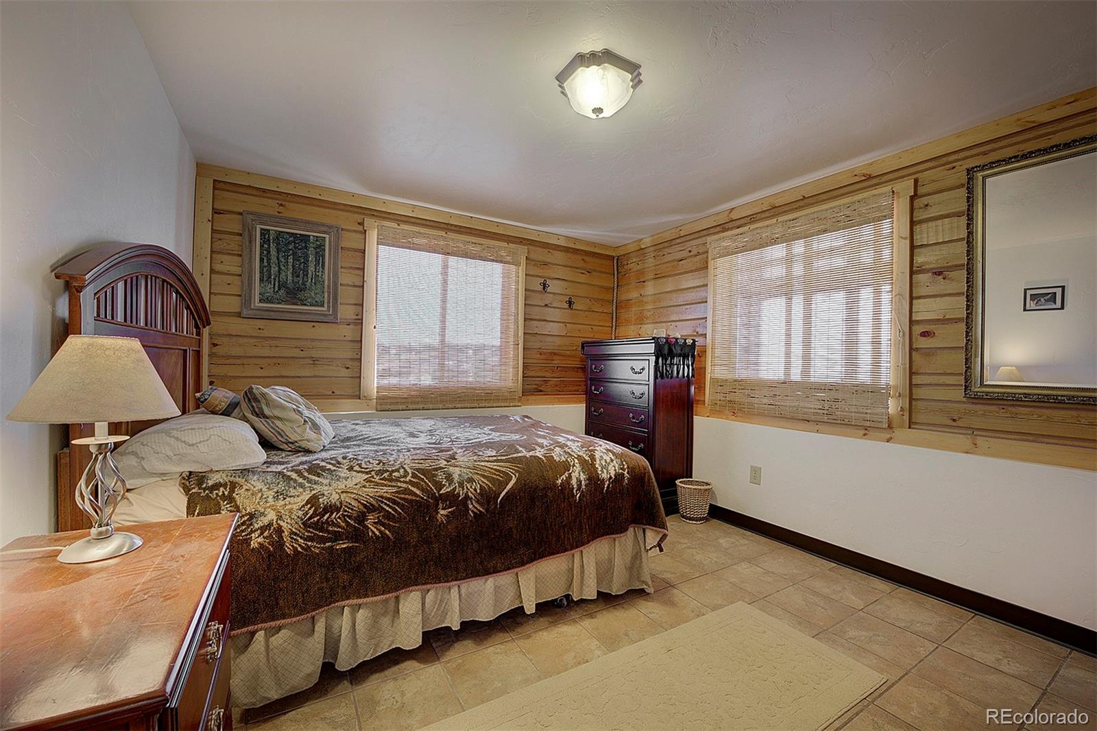 2005 Cahokia Road Hartsel, CO 80449 - Photo 11 of 42 a bedroom with a bed and a large window