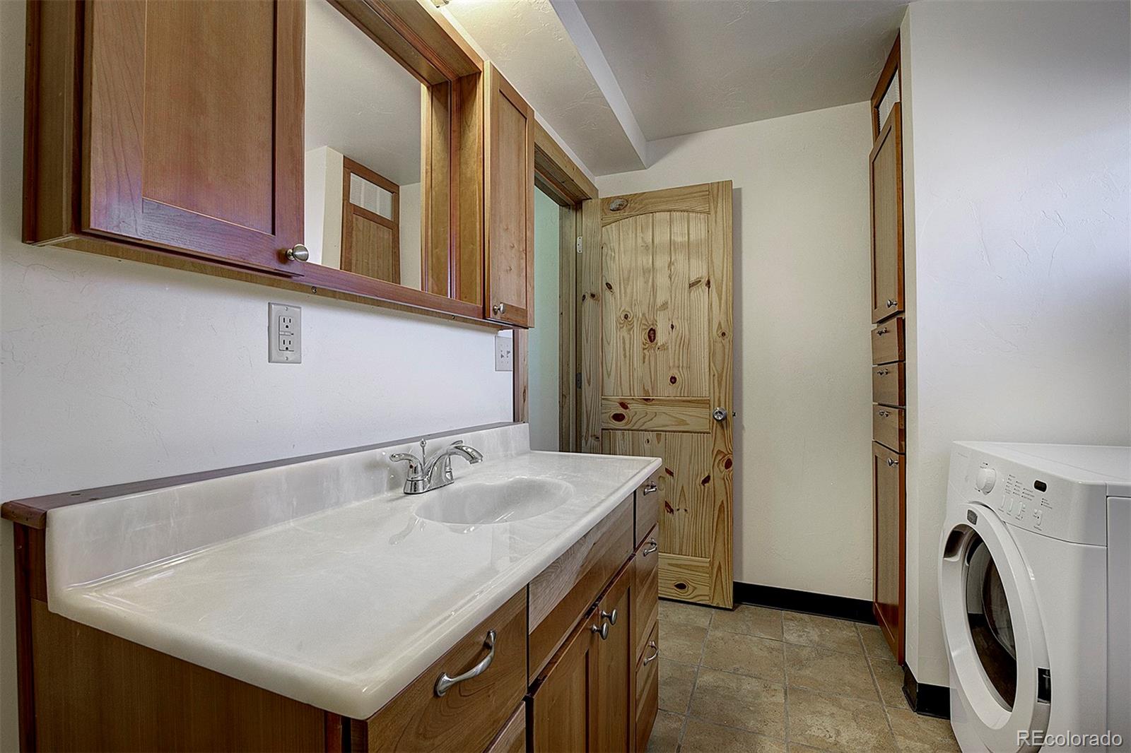 2005 Cahokia Road Hartsel, CO 80449 - Photo 16 of 42 a bathroom with a sink and a mirror