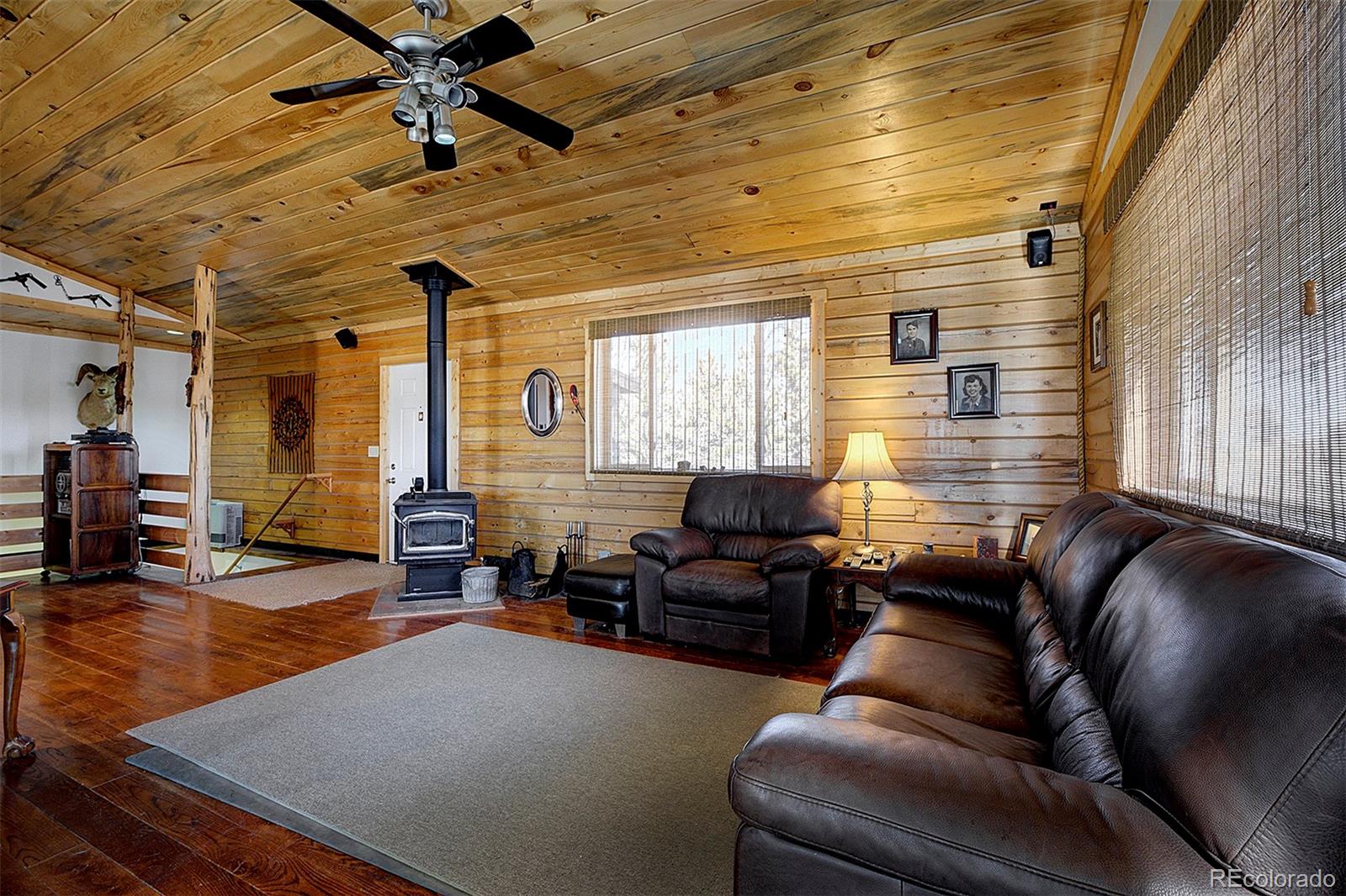 2005 Cahokia Road Hartsel, CO 80449 - Photo 23 of 42 a living room with furniture and a large window
