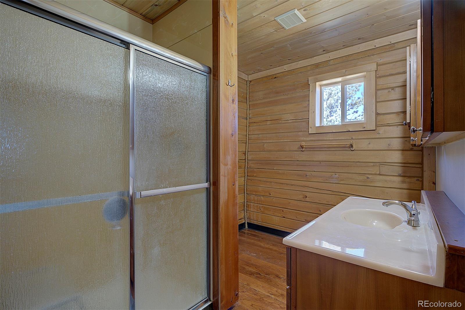 2005 Cahokia Road Hartsel, CO 80449 - Photo 26 of 42 a bathroom with a sink and a mirror