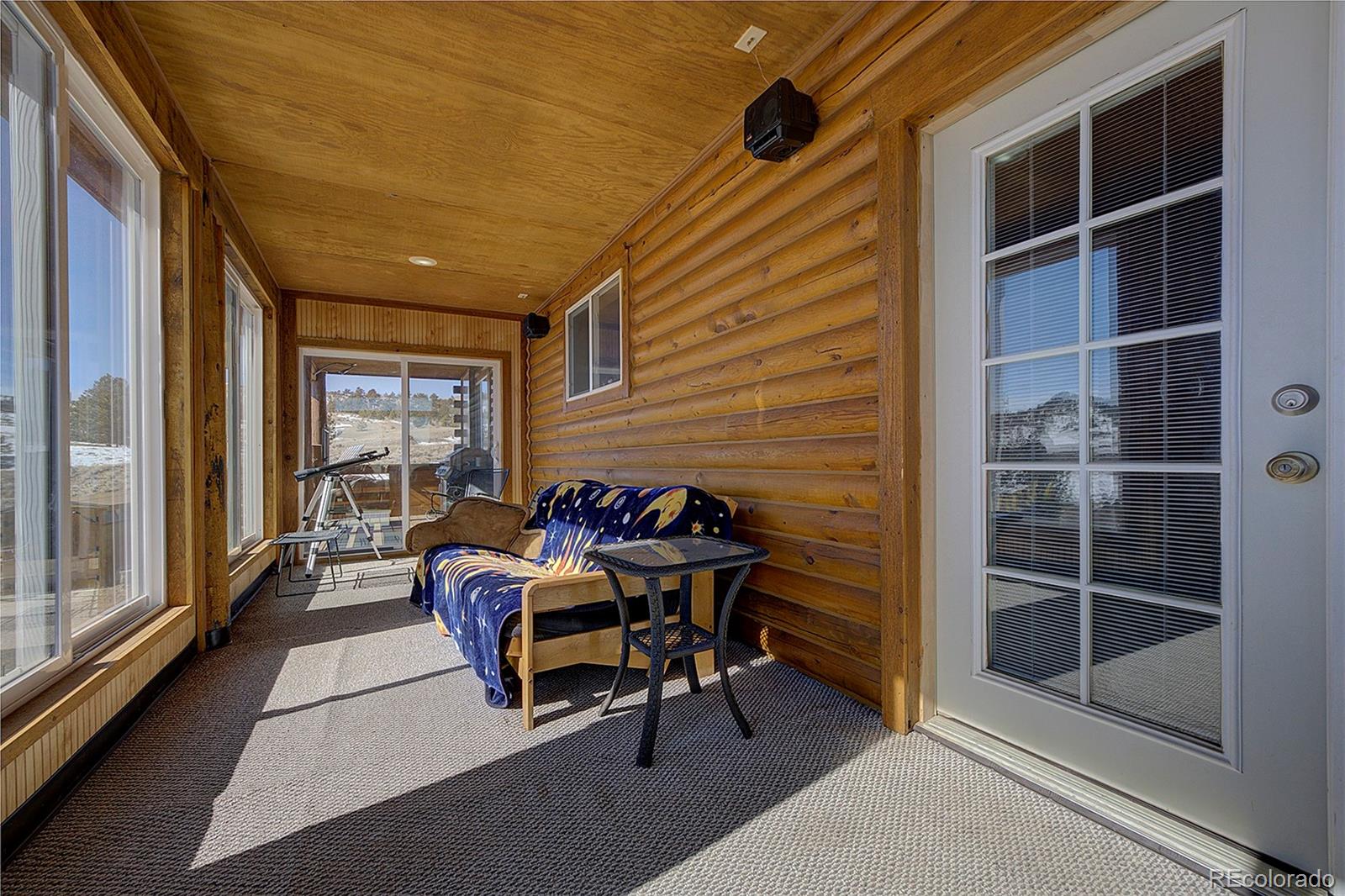 2005 Cahokia Road Hartsel, CO 80449 - Photo 31 of 42 a balcony with furniture and next to a window