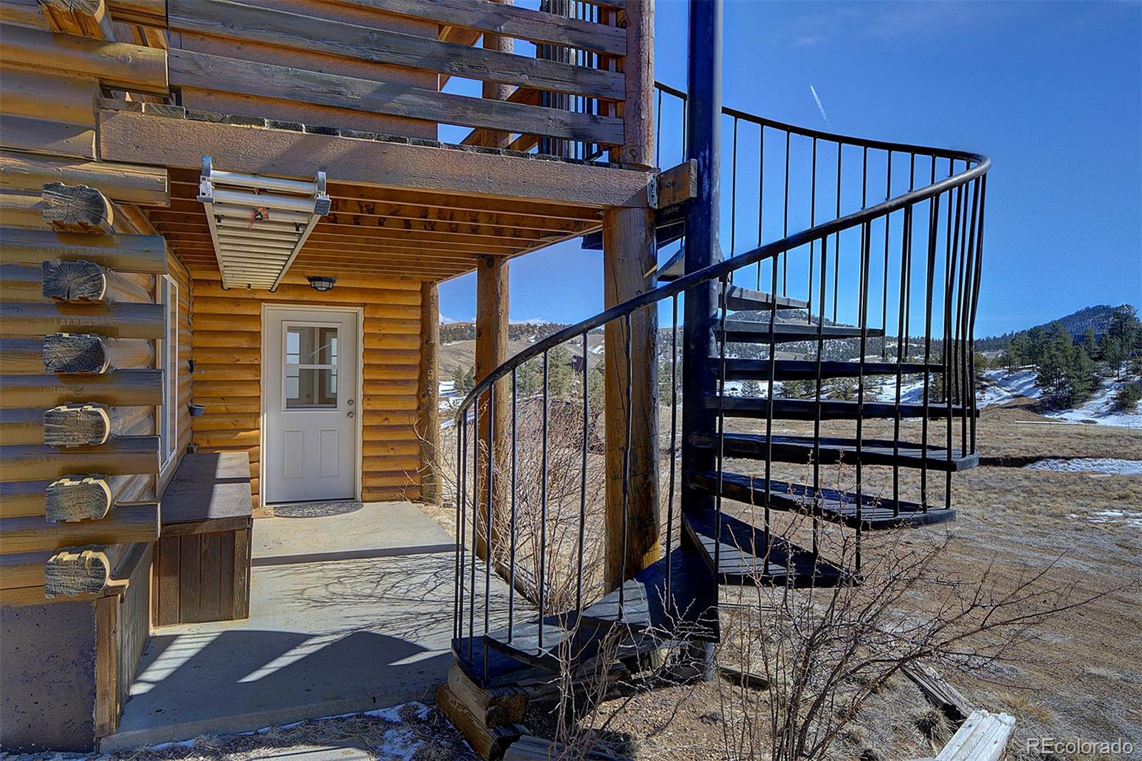 2005 Cahokia Road Hartsel, CO 80449 - Photo 5 of 42 a view of entryway with wooden stairs