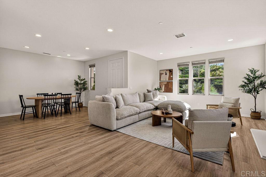 4301 Pacifica Way, Unit 2 Oceanside, CA 92056 - Photo 5 of 47 a living room with furniture and large windows