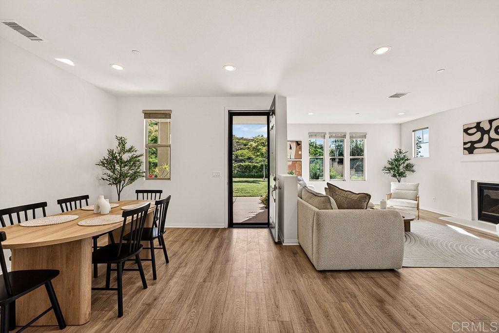 4301 Pacifica Way, Unit 2 Oceanside, CA 92056 - Photo 6 of 47 a living room with furniture and a wooden floor