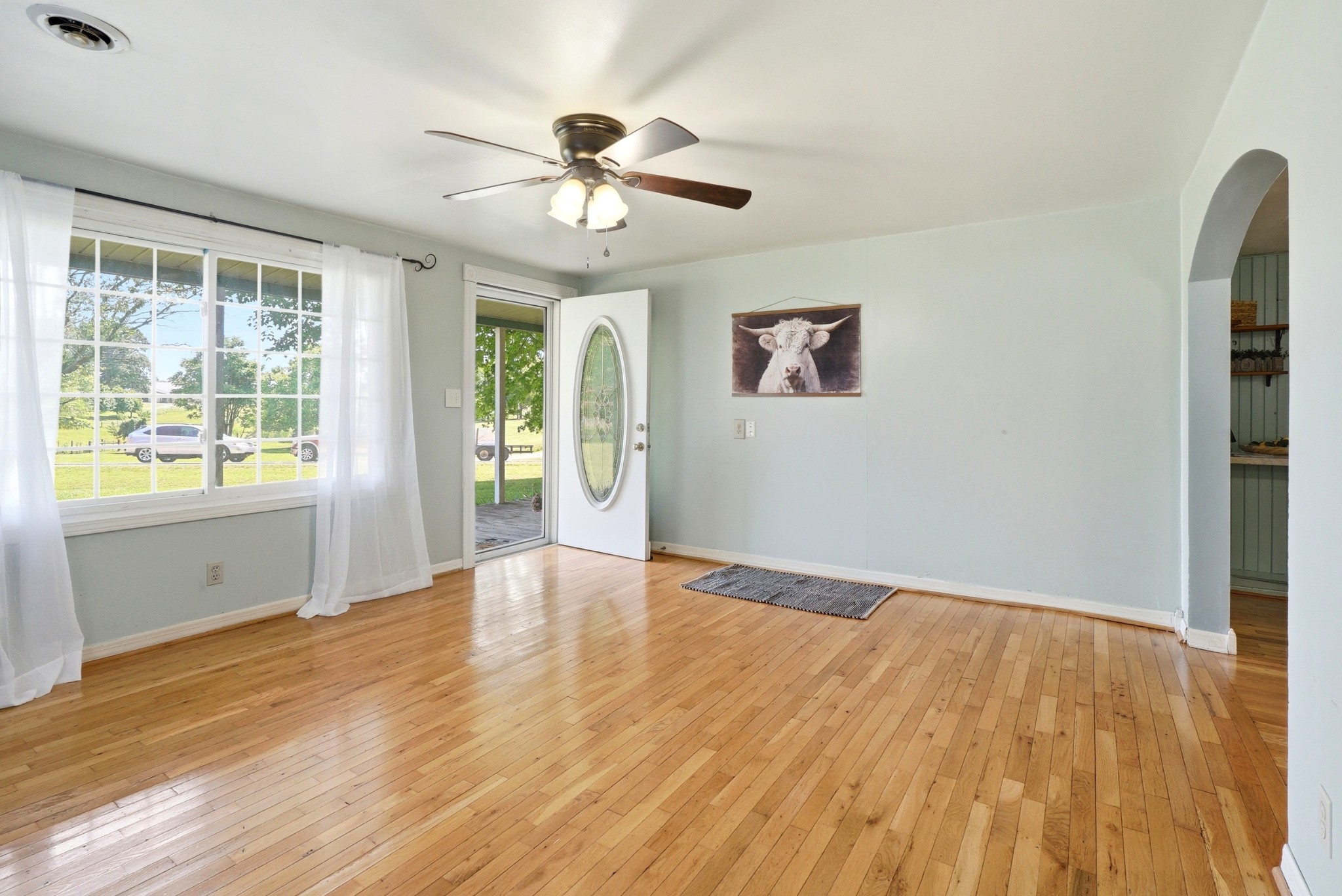 6471 Highway 161 Springfield, TN 37172 - Photo 11 of 57 a view of an empty room with wooden floor and a window