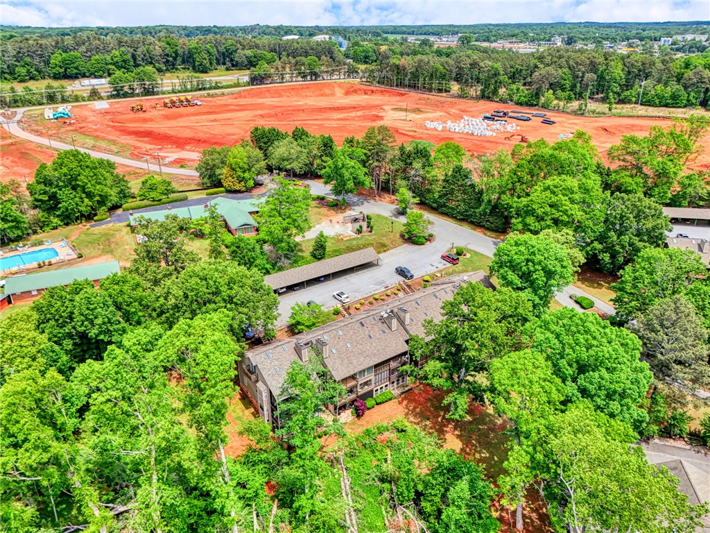 104 Captains Way Anderson, SC 29625 - Photo 30 of 47 An aerial view showcases a vibrant community with lush trees and a refreshing pool.
