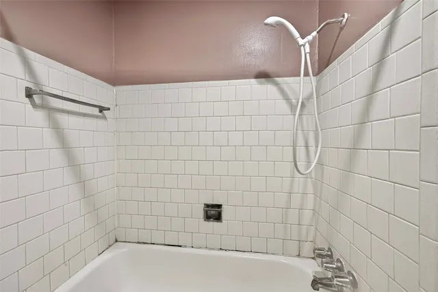 a bathroom with a bathtub