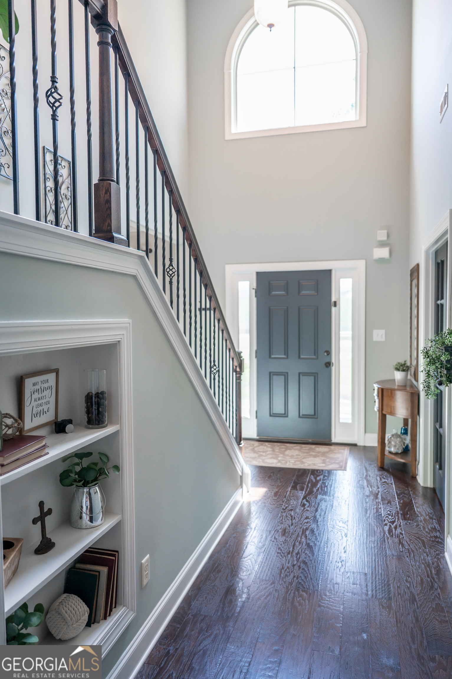 415 EAS Way Fayetteville, GA 30215 - Photo 4 of 70 a view of entryway and hall with wooden floor