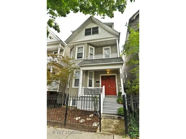 a front view of a house with garage