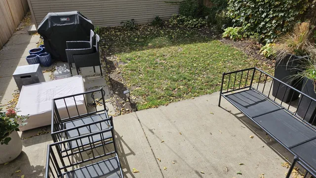 a view of balcony with wooden floor