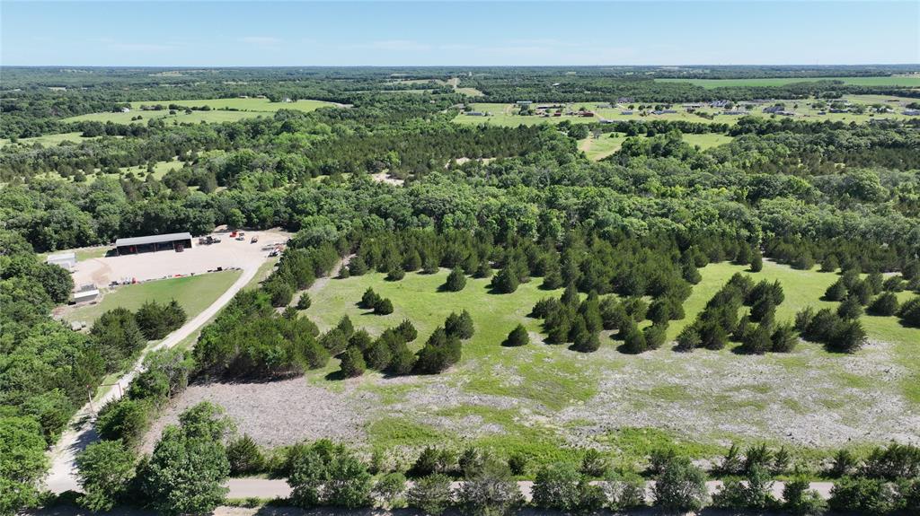 Tbd1 Tbd1 Rochelle Cannon Road Bells, TX 75414 - Photo 2 of 23 an aerial view of a house with a yard