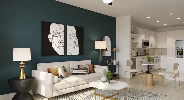 a living room with furniture and a table