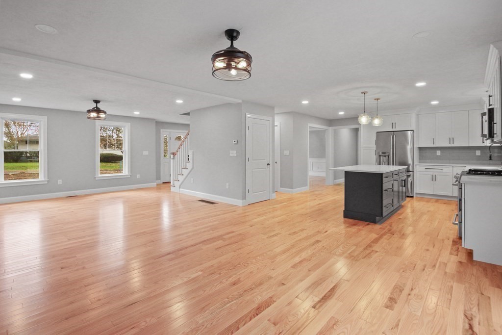 529 Chadwick Road Haverhill, MA 01835 - Photo 14 of 38 a view of kitchen and hall with wooden floor