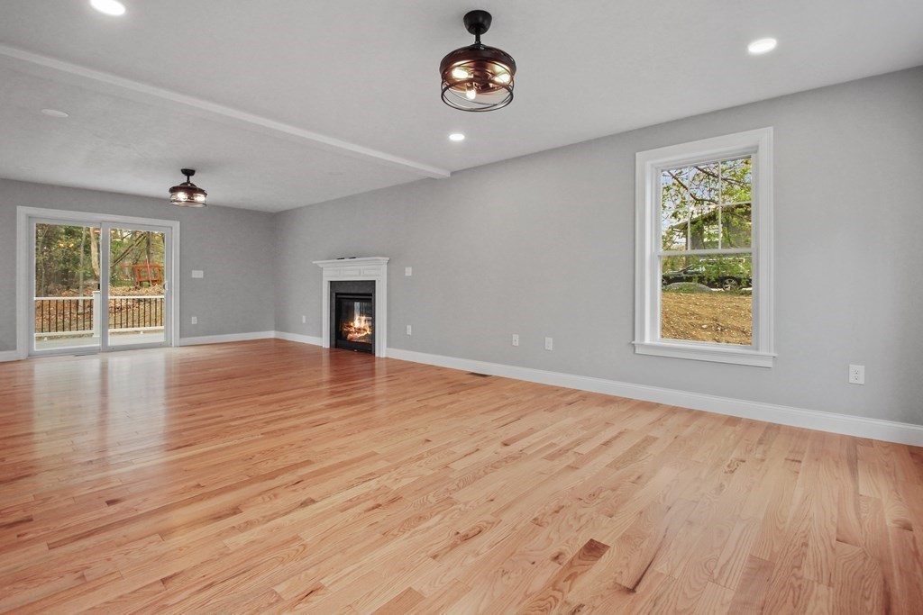 529 Chadwick Road Haverhill, MA 01835 - Photo 15 of 38 wooden floor in an empty room with a window