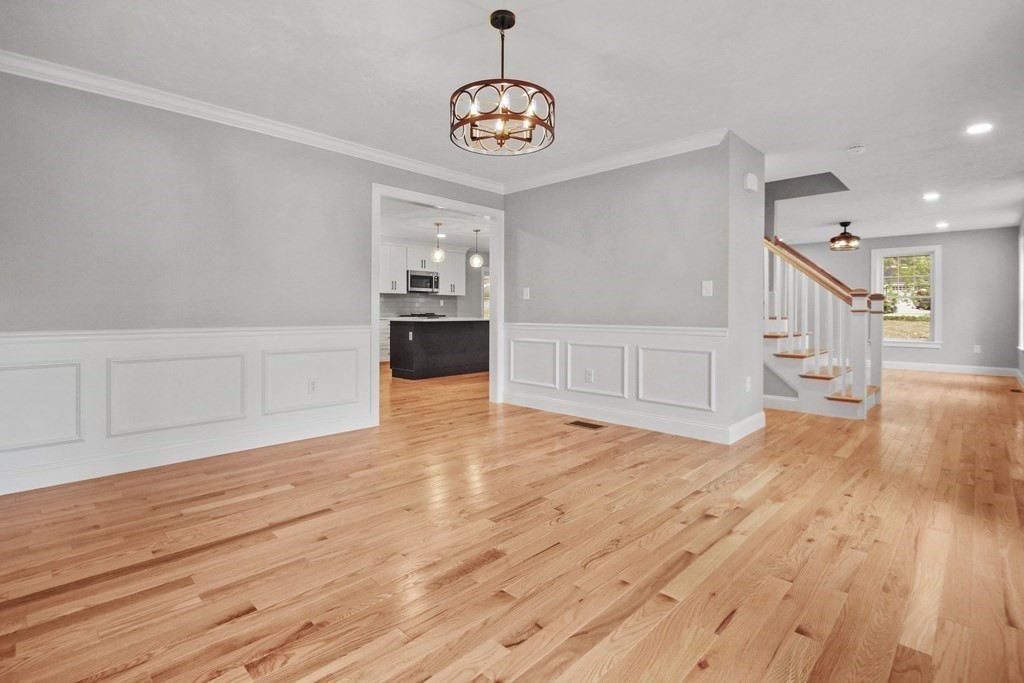 529 Chadwick Road Haverhill, MA 01835 - Photo 17 of 38 a view of empty room with wooden floor
