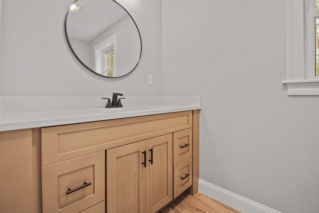 529 Chadwick Road Haverhill, MA 01835 - Photo 20 of 38 a bathroom with a sink and a mirror