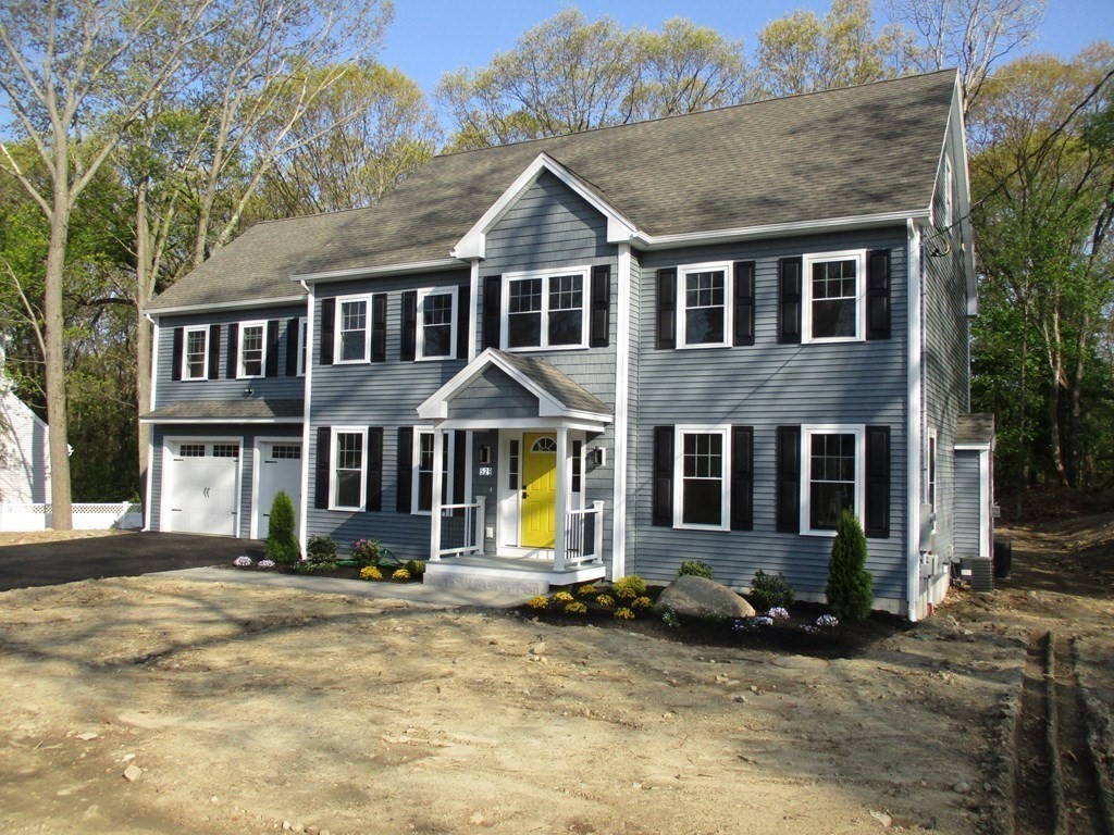 529 Chadwick Road Haverhill, MA 01835 - Photo 2 of 38 a front view of a house with a yard