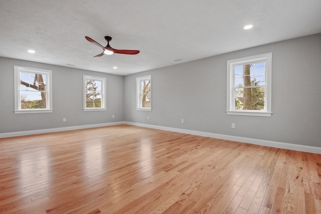 529 Chadwick Road Haverhill, MA 01835 - Photo 22 of 38 a view of an empty room with wooden floor and a window