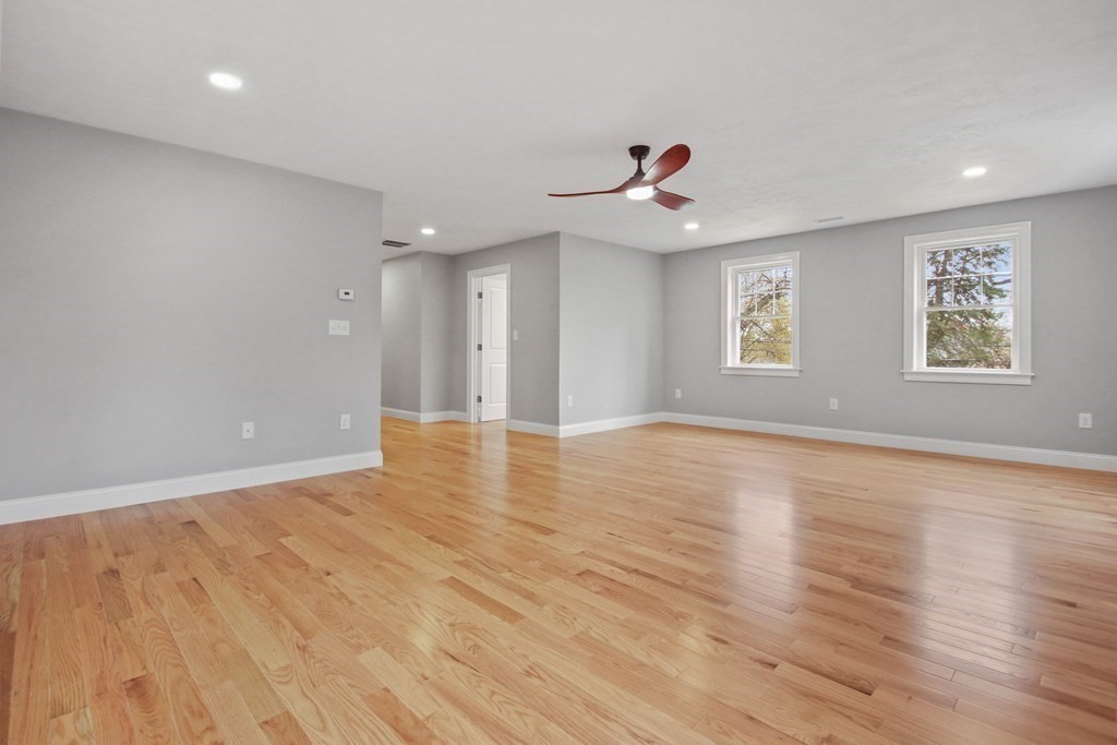 529 Chadwick Road Haverhill, MA 01835 - Photo 23 of 38 a view of an empty room with wooden floor and a window