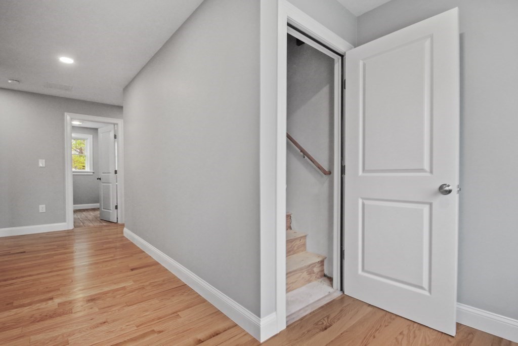 529 Chadwick Road Haverhill, MA 01835 - Photo 35 of 38 a view of an empty room with wooden floor and a bathroom
