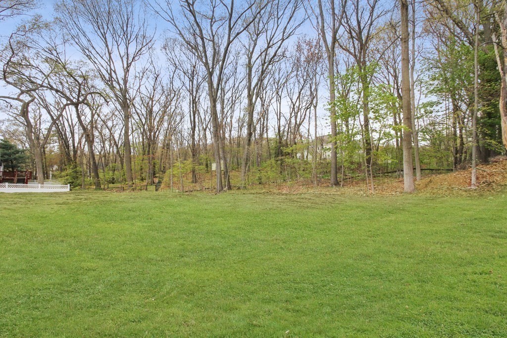 529 Chadwick Road Haverhill, MA 01835 - Photo 38 of 38 a view of outdoor space with green field and trees