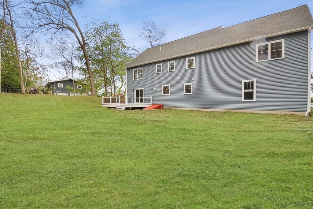 529 Chadwick Road Haverhill, MA 01835 - Photo 5 of 38 a view of a house with a big yard