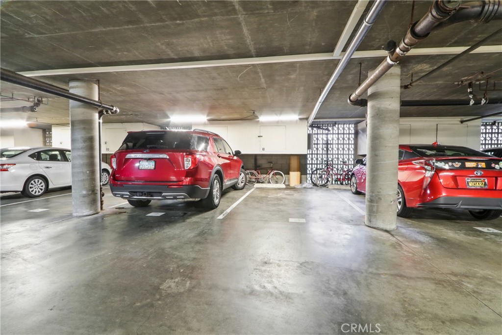 1187 East 3rd Street, Unit 215 Long Beach, CA 90802 - Photo 11 of 15 a view of car garage