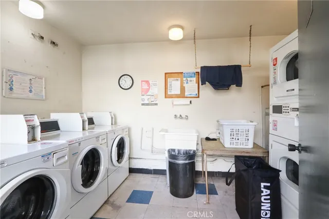 a view of kitchen sink washer and dryer